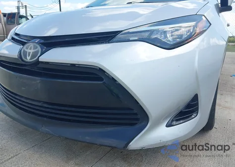 2017 Toyota Corolla Le z USA, uszkodzony, nr VIN 5YFBURHE8HP638855